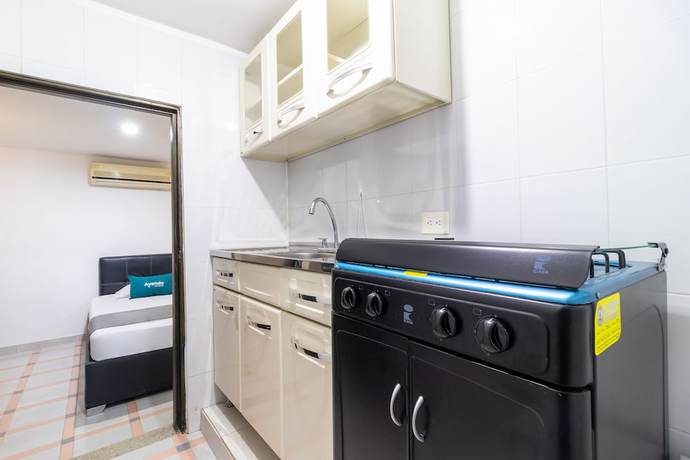 Imagen de la habitación del Hotel Ayenda Oporto Suites. Foto 16