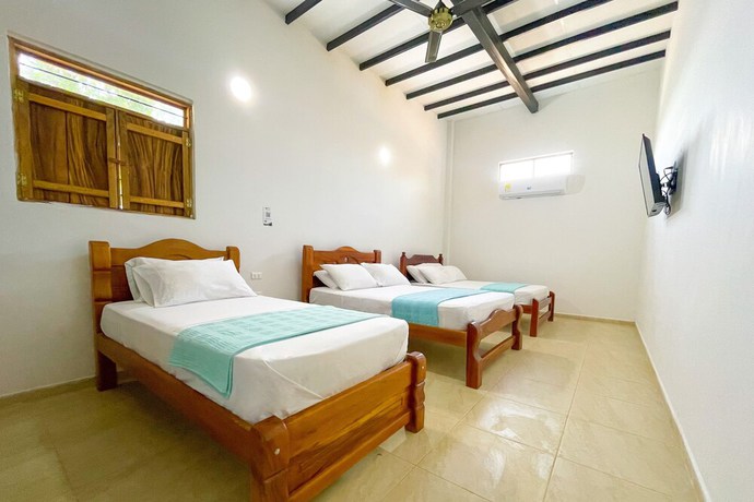 Imagen de la habitación del Hotel Ayenda Palmas del Rio. Foto 10