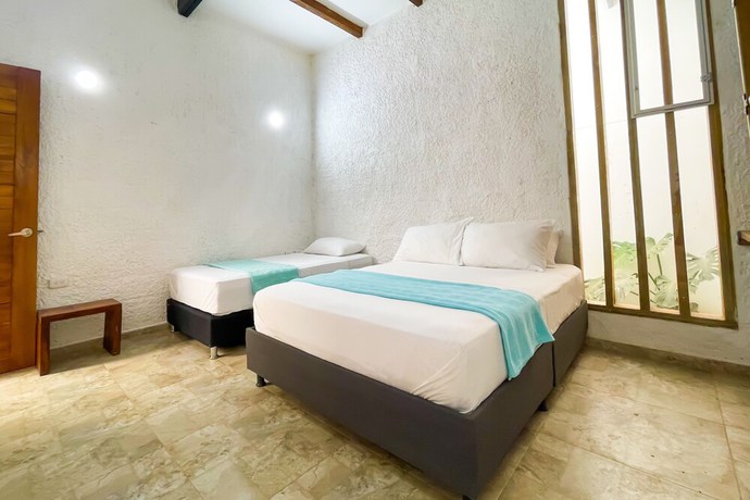 Imagen de la habitación del Hotel Ayenda Palmas del Rio. Foto 18