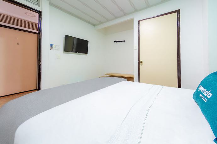 Imagen de la habitación del Hotel Ayenda Portal del Cable. Foto 5