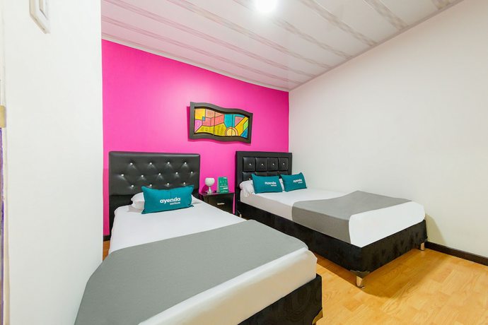Imagen de la habitación del Hotel Ayenda Portal del Cable. Foto 10