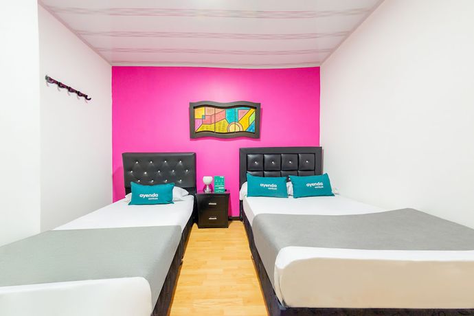 Imagen de la habitación del Hotel Ayenda Portal del Cable. Foto 15