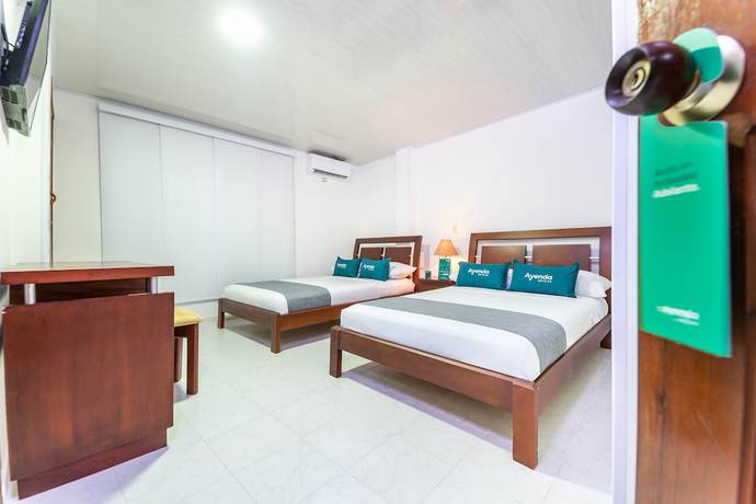 Imagen de la habitación del Hotel Ayenda Portal del Llano. Foto 2
