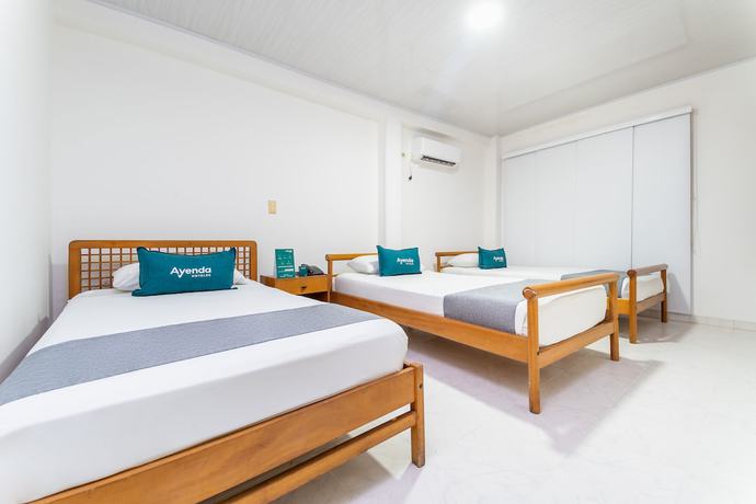 Imagen de la habitación del Hotel Ayenda Portal del Llano. Foto 5