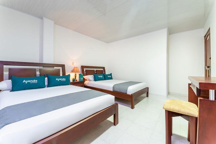 Imagen de la habitación del Hotel Ayenda Portal del Llano. Foto 9