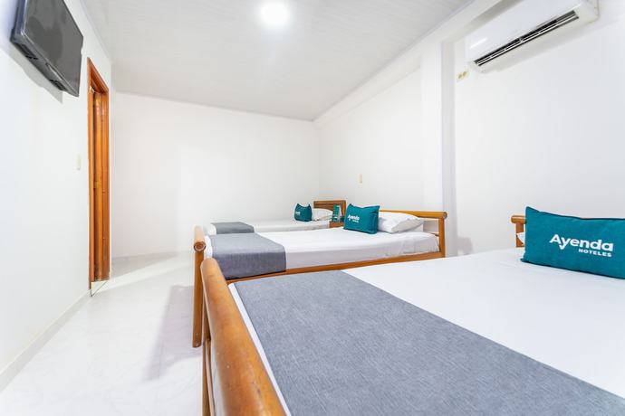 Imagen de la habitación del Hotel Ayenda Portal del Llano. Foto 12