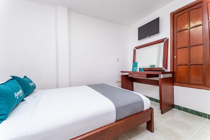Imagen de la habitación del Hotel Ayenda Portal del Llano. Foto 14