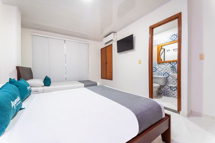 Imagen de la habitación del Hotel Ayenda Portal del Llano. Foto 15