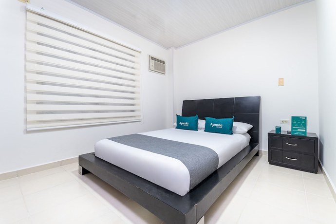 Imagen de la habitación del Hotel Ayenda Portal del Llano. Foto 16