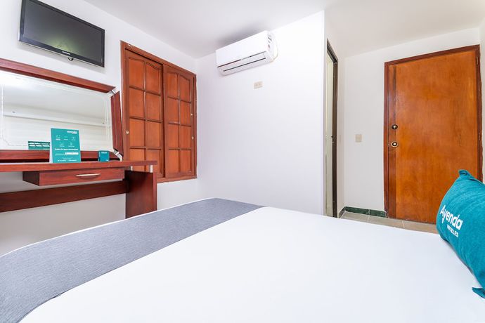 Imagen de la habitación del Hotel Ayenda Portal del Llano. Foto 19