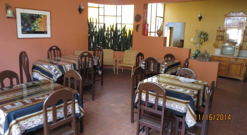 Imagen del bar/restaurante del Hotel Ayenda Posada San Juan. Foto 2