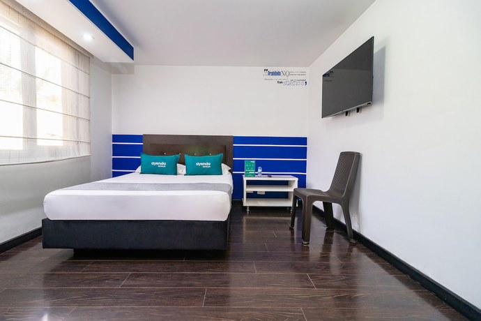 Imagen de la habitación del Hotel Ayenda Puerto Madero Boutique. Foto 8