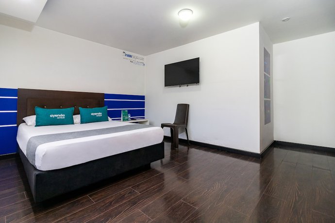 Imagen de la habitación del Hotel Ayenda Puerto Madero Boutique. Foto 9