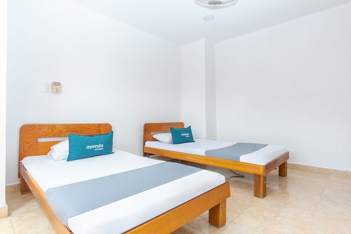 Imagen de la habitación del Hotel Ayenda Santander. Foto 13