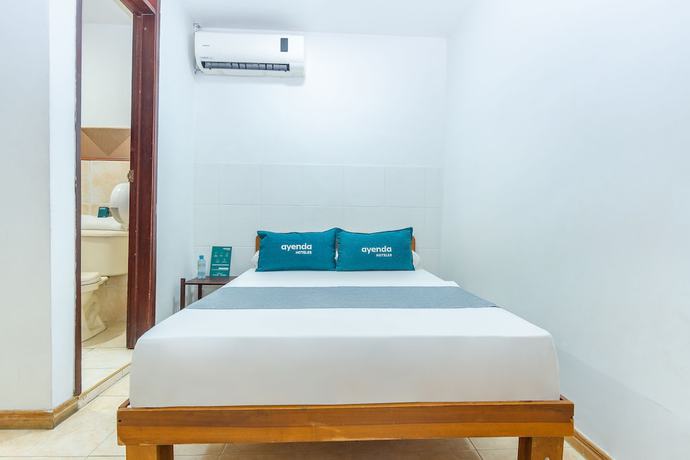 Imagen de la habitación del Hotel Ayenda Santander. Foto 15
