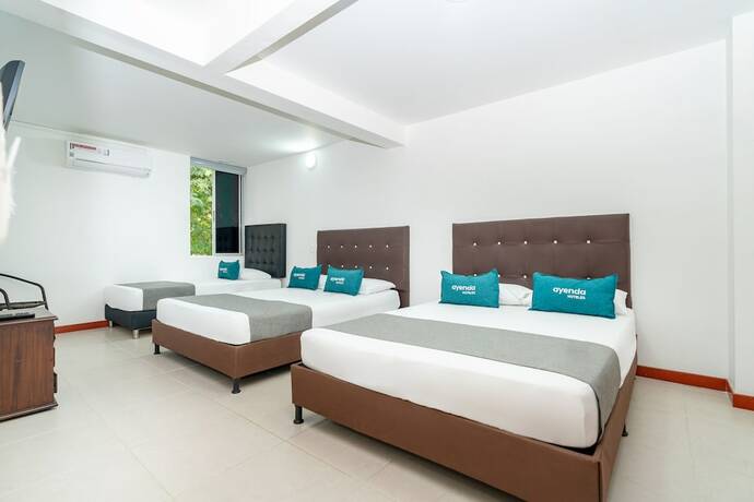 Imagen de la habitación del Hotel Ayenda Villa Park Real. Foto 11