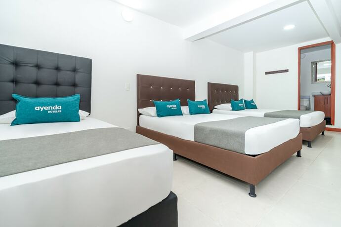 Imagen de la habitación del Hotel Ayenda Villa Park Real. Foto 12
