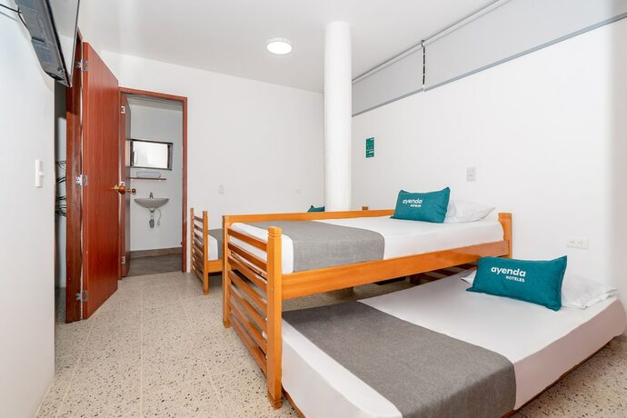 Imagen de la habitación del Hotel Ayenda Villa Park Real. Foto 13