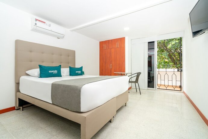 Imagen de la habitación del Hotel Ayenda Villa Park Real. Foto 14