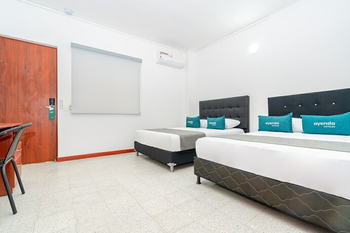 Imagen de la habitación del Hotel Ayenda Villa Park Real. Foto 16
