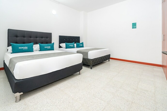 Imagen de la habitación del Hotel Ayenda Villa Park Real. Foto 18