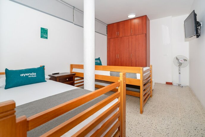 Imagen de la habitación del Hotel Ayenda Villa Park Real. Foto 20