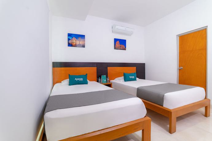 Imagen de la habitación del Hotel Ayenda Zhena. Foto 8