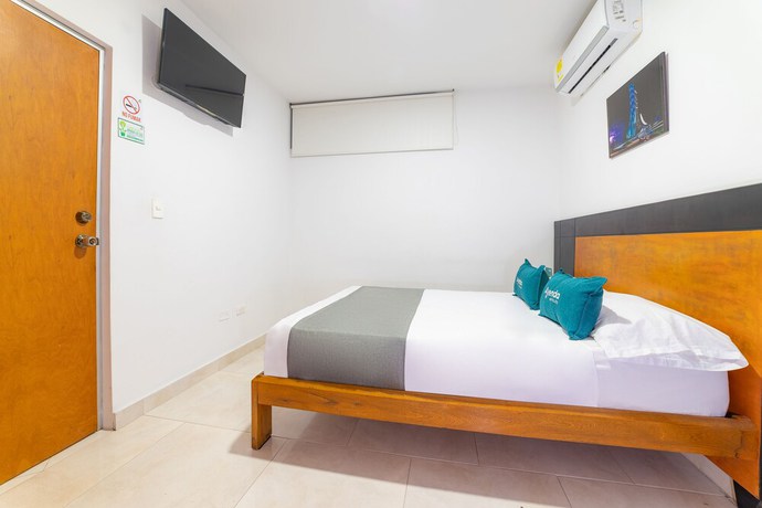 Imagen de la habitación del Hotel Ayenda Zhena. Foto 12