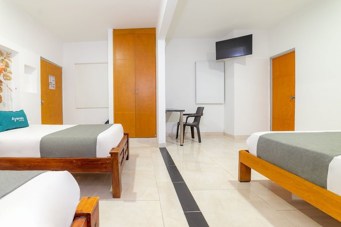 Imagen de la habitación del Hotel Ayenda Zhena. Foto 13
