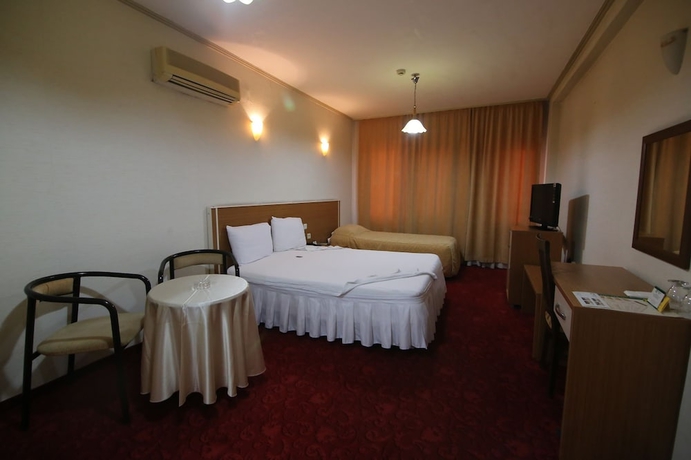 Imagen de la habitación del Hotel Aykut Palace Otel. Foto 6