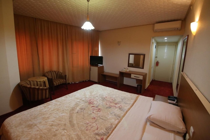 Imagen de la habitación del Hotel Aykut Palace Otel. Foto 11