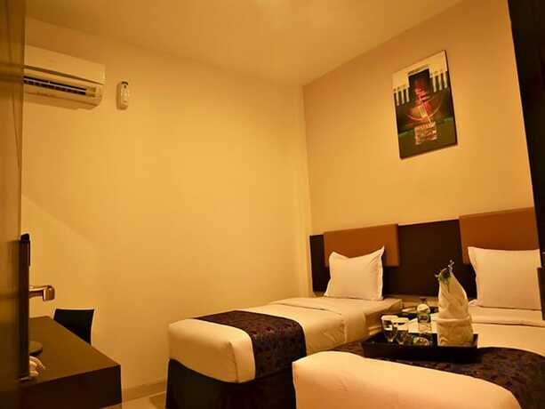 Imagen de la habitación del Hotel Ayla City. Foto 20