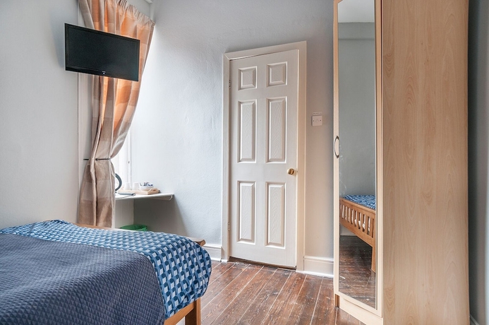 Imagen de la habitación del Hotel Aynetree Guest House. Foto 14