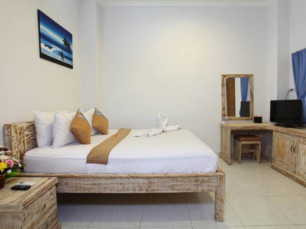 Imagen de la habitación del Hotel Ayodhya Guest House Uluwatu. Foto 7