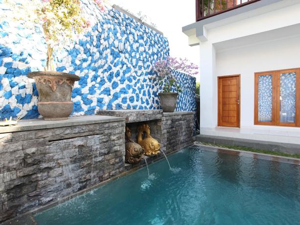 Imagen de la piscina del Hotel Ayodhya Guest House Uluwatu. Foto 20