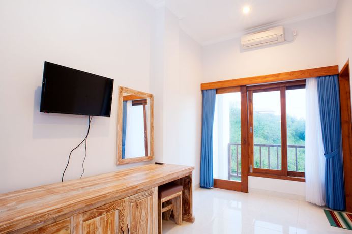 Imagen de la habitación del Hotel Ayodhya Guest House Uluwatu. Foto 13
