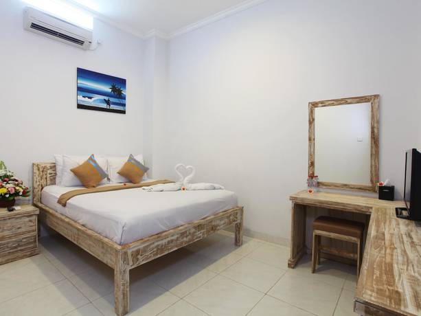 Imagen de la habitación del Hotel Ayodhya Guest House Uluwatu. Foto 15