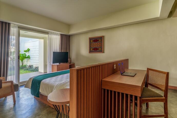 Imagen de la habitación del Hotel Ayom Suite. Foto 15