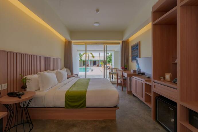 Imagen de la habitación del Hotel Ayom Suite. Foto 16