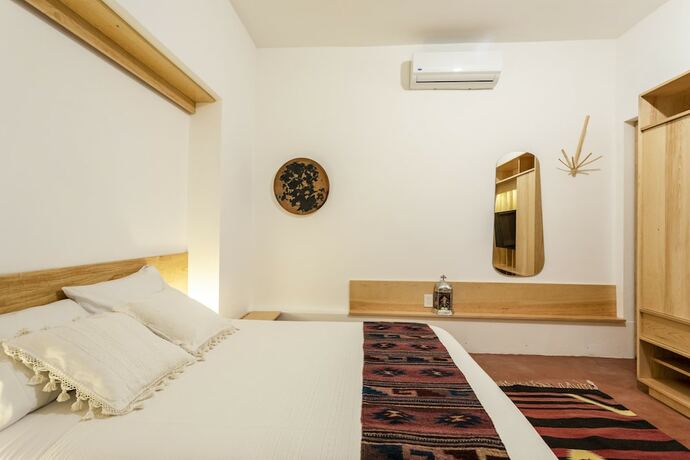 Imagen de la habitación del Hotel Ayook. Foto 11