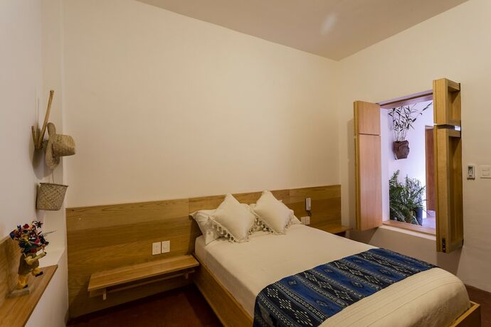 Imagen de la habitación del Hotel Ayook. Foto 13