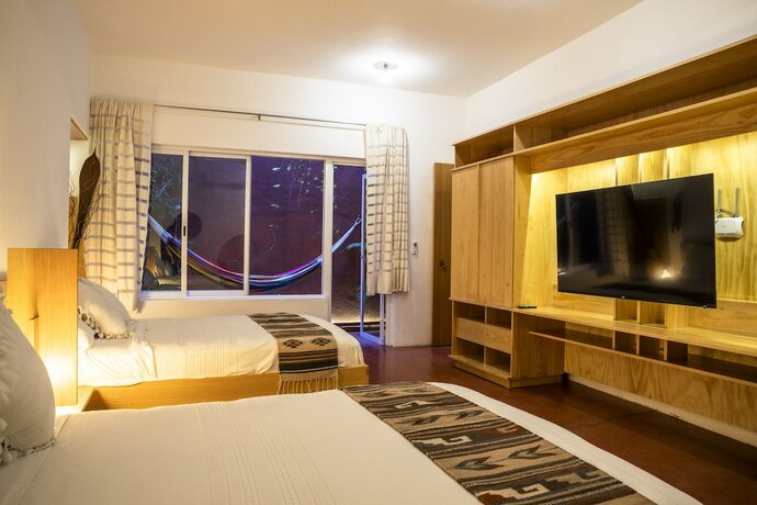 Imagen de la habitación del Hotel Ayook. Foto 14