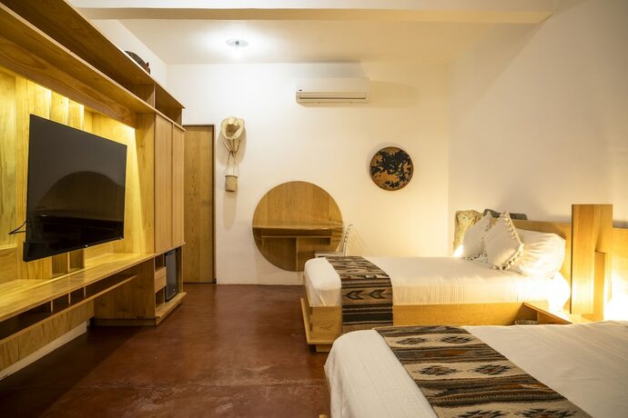 Imagen de la habitación del Hotel Ayook. Foto 19