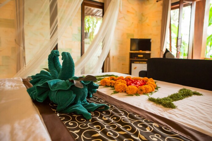 Imagen de la habitación del Hotel Ayu Duwur Beji. Foto 19