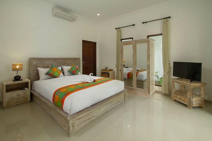 Imagen de la habitación del Hotel Ayu Shanti Guest House Ubud. Foto 17