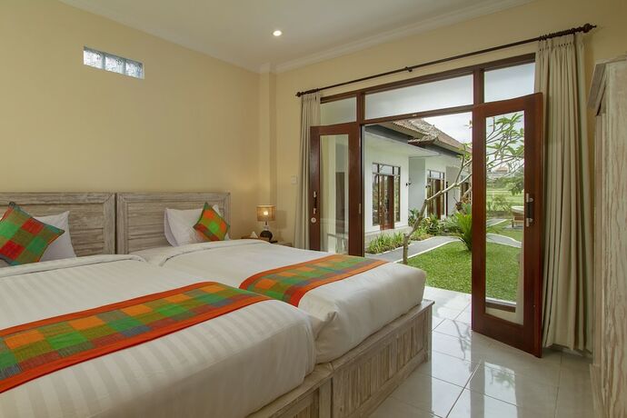 Imagen de la habitación del Hotel Ayu Shanti Guest House Ubud. Foto 19
