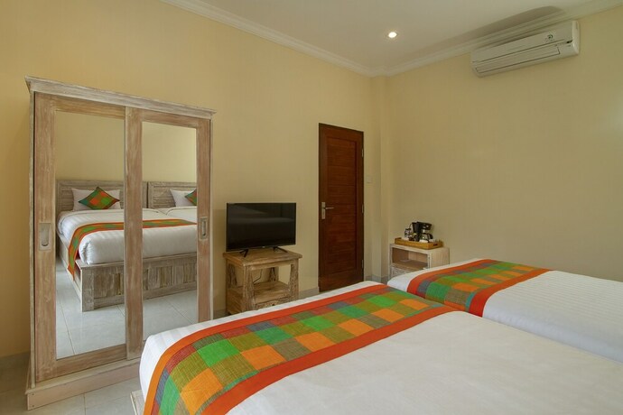 Imagen de la habitación del Hotel Ayu Shanti Guest House Ubud. Foto 22