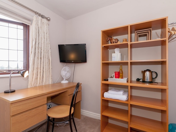 Imagen de la habitación del Hotel Ayuda House. Foto 14