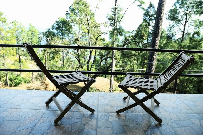 Imagen de la habitación del Hotel Ayush Cottages by OpenSky. Foto 12