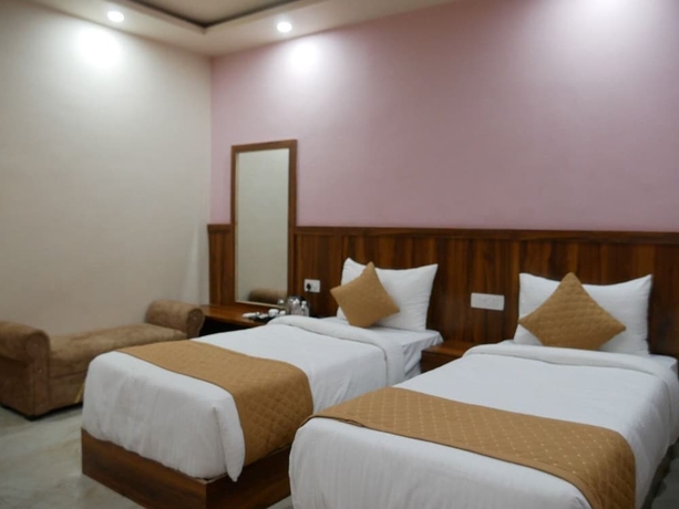Imagen de la habitación del Hotel AyushMan Inn. Foto 7